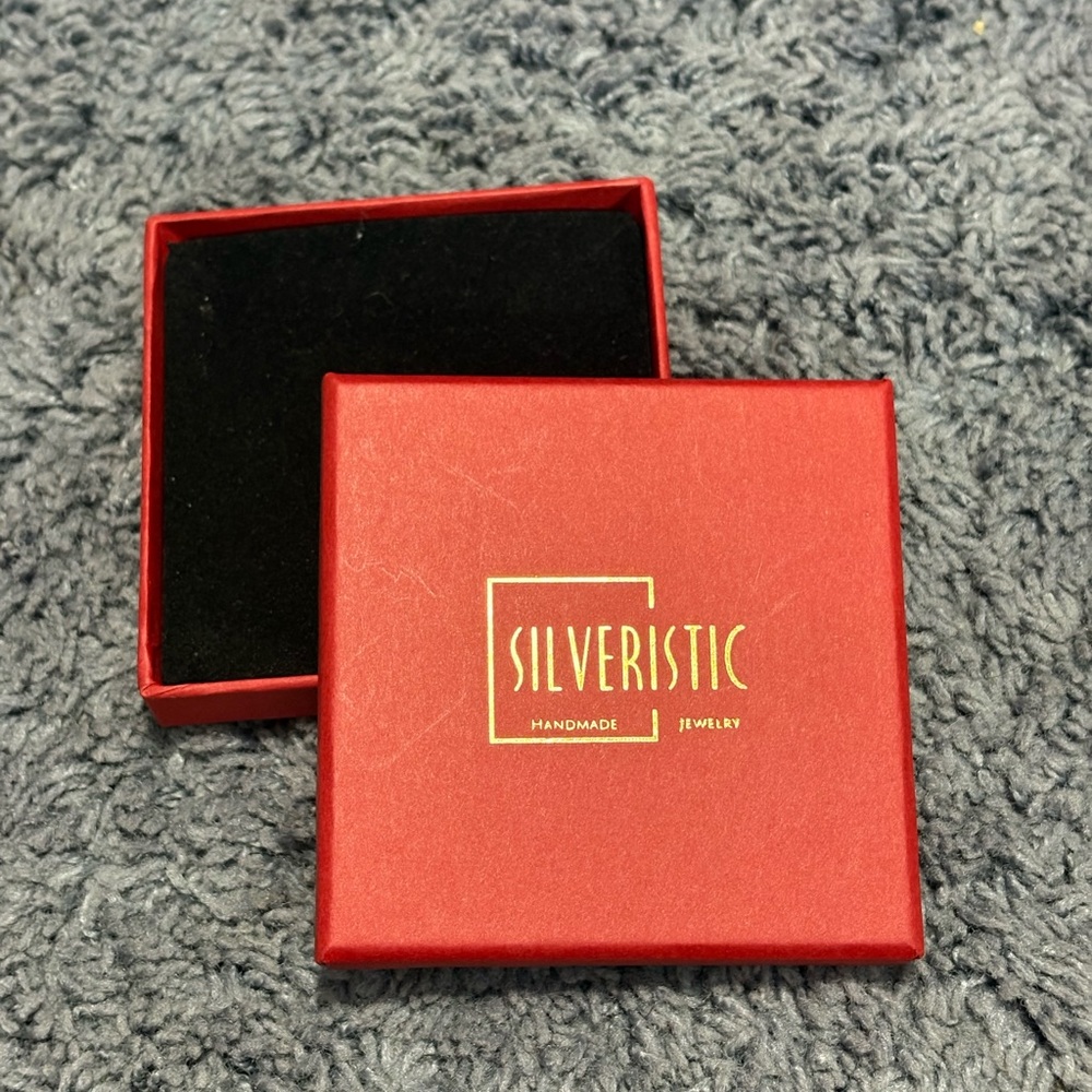 NWT empty red jewelry square box with a black padded inside